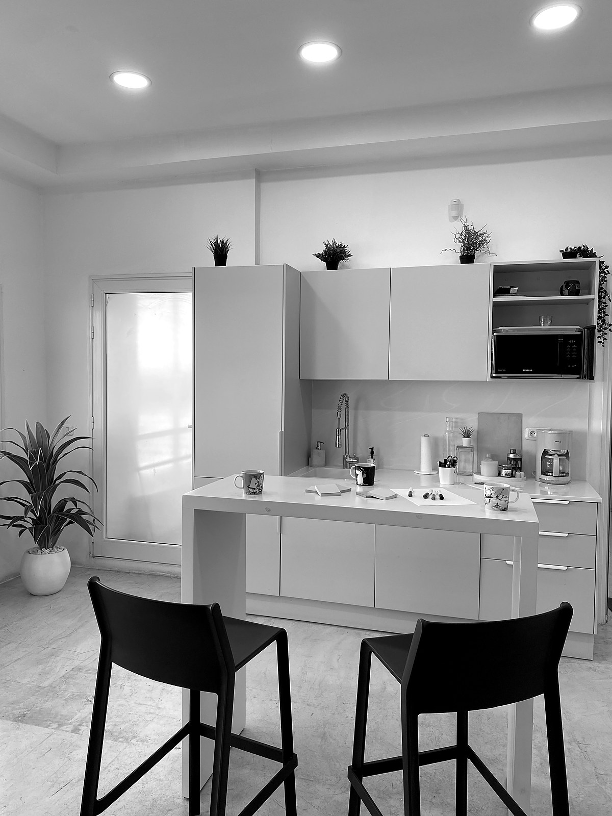 Le coin café et cuisine du studio Dooni.